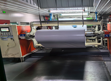 Details of self-adhesive vinyl being produced on the machine.
