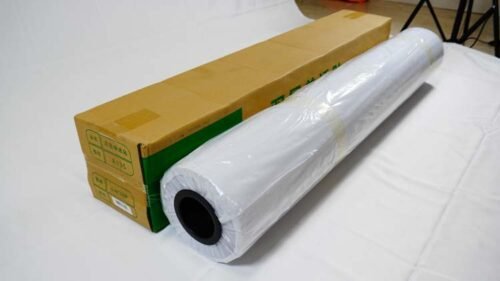 Real-life photos of one-way transparent vinyl film rolls.